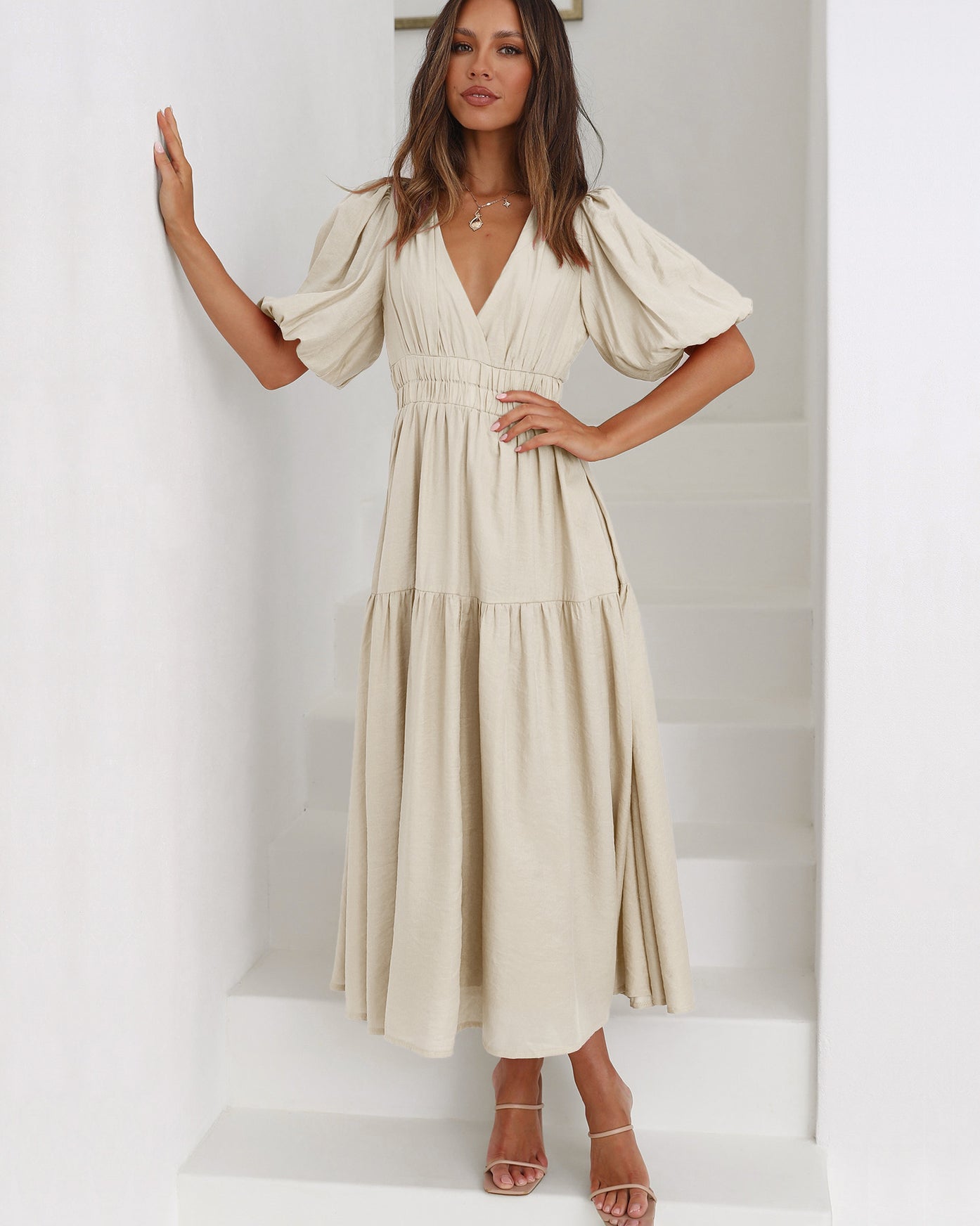 Emilia - dress with V-neck and puff sleeves