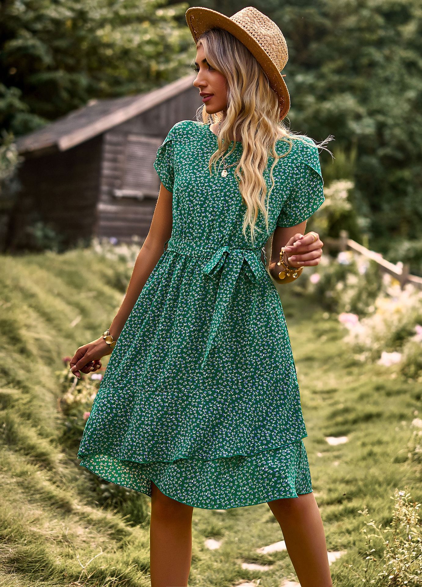 Emily – short-sleeved green mini dress with polka dots