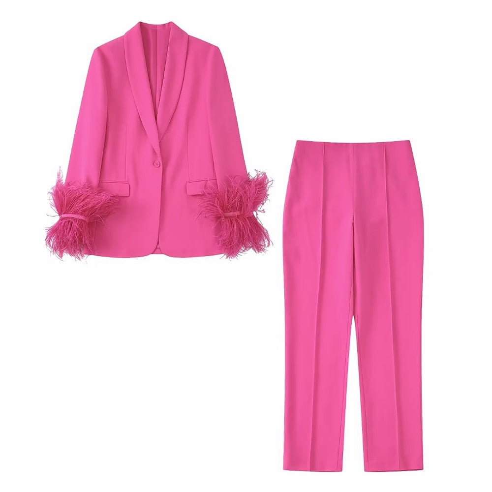 Pink suit with feathers