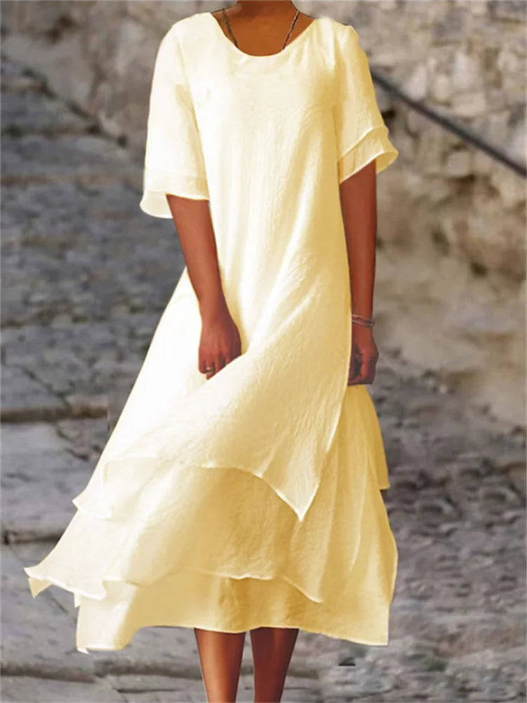 Avianna - Double layered dress with short sleeves and round neckline
