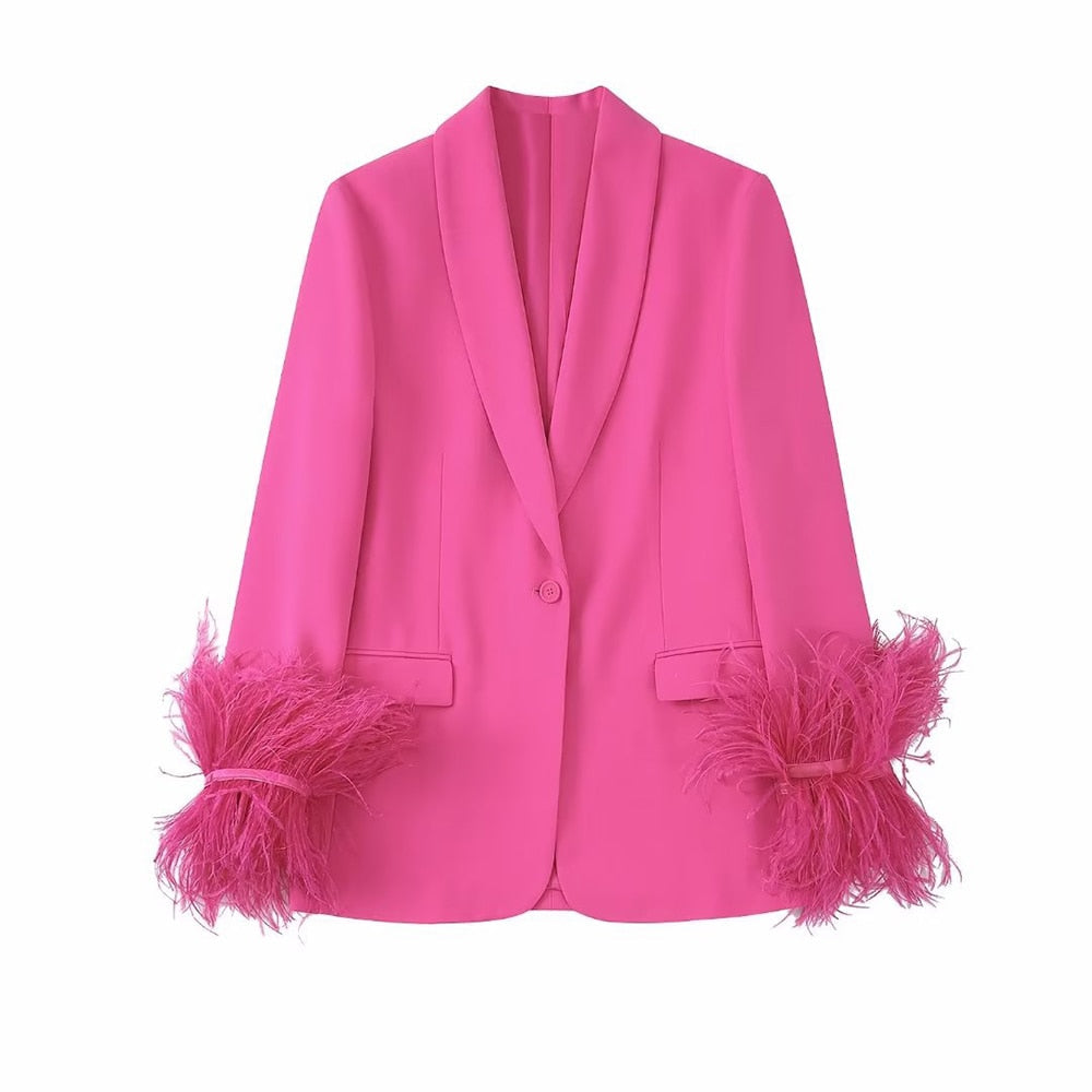 Pink suit with feathers