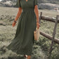 Lucy – Elegant short-sleeved dress with a choir collar