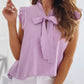 Sleeveless Blouse with Ruffles and Bow Detail