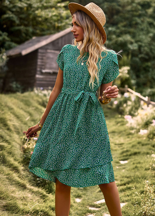 Emily – short-sleeved green mini dress with polka dots