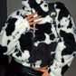 Jacqueline - Fluffy coat with cow print and zipper at the front
