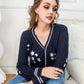 Ada - Cardigan with button closure and star pattern
