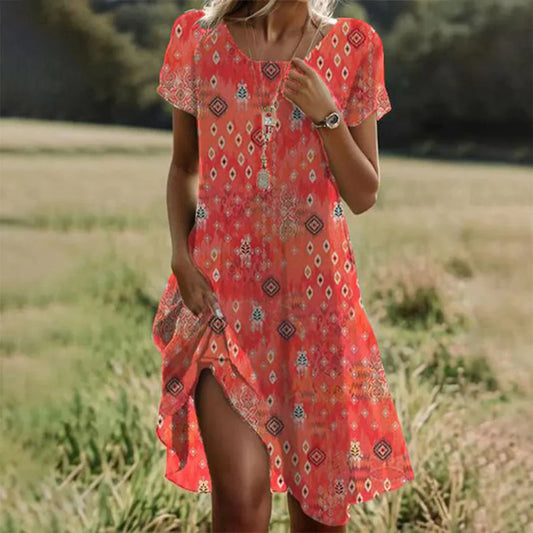 Sophia – orange midi dress with short sleeves and round neckline