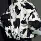 Jacqueline - Fluffy coat with cow print and zipper at the front