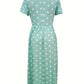 Eleanor – light, short-sleeved, polka-dotted dress with round neckline