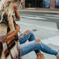 Helena - Chic striped poncho vest