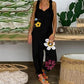 Carissa - Backless jumpsuit with floral print