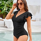 Alma - Swim shorts with ruffled sleeves and V-back