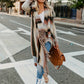 Helena - Chic striped poncho vest