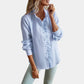 Striped Women's Blouse with Ruffles and Elegant Button Closure