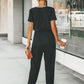 Black jumpsuit with short sleeves