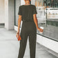 Black jumpsuit with short sleeves