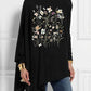 Nadini | Figure Graphic Batwing Sleeve Mock Neck Blouse - Unique & Chic