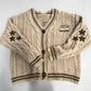 Ada - Cardigan with button closure and star pattern