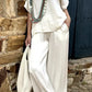 Airelyn - Elegant white top with V-neck and wide legs