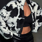 Jacqueline - Fluffy coat with cow print and zipper at the front