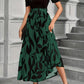 Luna – dress with floral print and round neckline