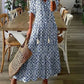 Boho Maxi Dress in White with Floral Pattern – Breezy Summer Dress with V-Neck and Tassels